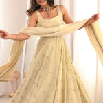 Beautiful Beige Color Cosmos Gold Embroidery Work Gown